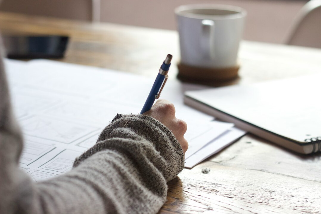 person writing blog post