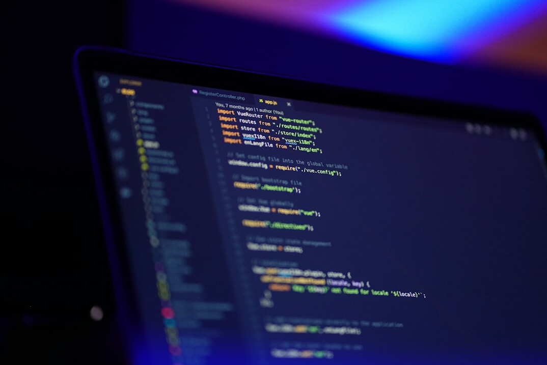 web developer coding laptop